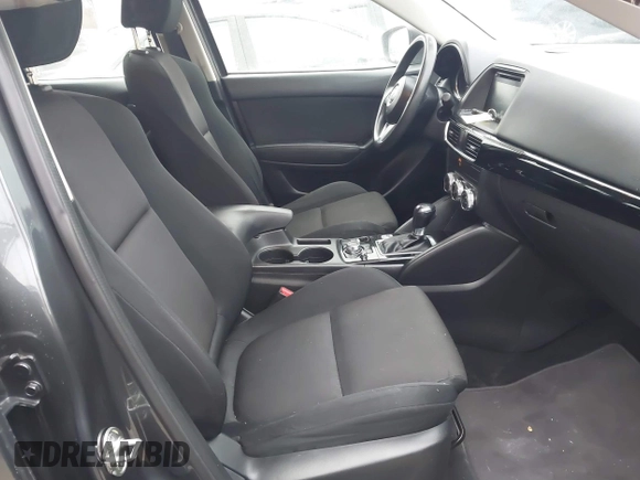 2016 Mazda CX-5 Sport with VIN JM3KE4BY5G0885754, listed as a IAAI auction lot 41103575 with 136,263 mi miles and . Bid and sale history available at carsss.com. Image 5.