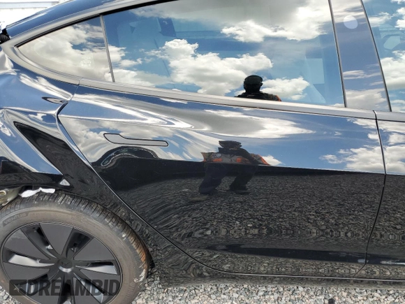 2025 Tesla Model 3 Long Range with VIN 5YJ3E1EA8SF984931, listed as a Copart auction lot 61259345 with 2,248 mi miles and Salvage title. Bid and sale history available at DreamBid. Image 10.
