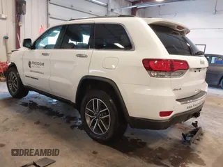 2021 Jeep Grand Cherokee 80th Anniversary with VIN 1C4RJFBG6MC569585, listed as a IAAI auction lot 41341608 with 73,234 mi miles and . Bid and sale history available at DreamBid. Image 3.