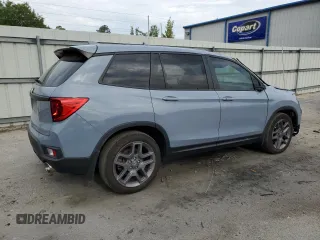 2022 Honda Passport EX-L z VIN 5FNYF7H51NB004450, wystawiony jako Copart lot #54874325 z przebiegiem 33 453 mil mil oraz Szkody całkowita. Historia ofert i sprzedaży dostępna na DreamBid. Obrazek 3.