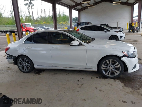 2015 Mercedes-Benz C 300 Luxury with VIN 55SWF4KB6FU023015, listed as a IAAI auction lot 42153797 with 47,639 mi miles and . Bid and sale history available at carsss.com. Image 14.