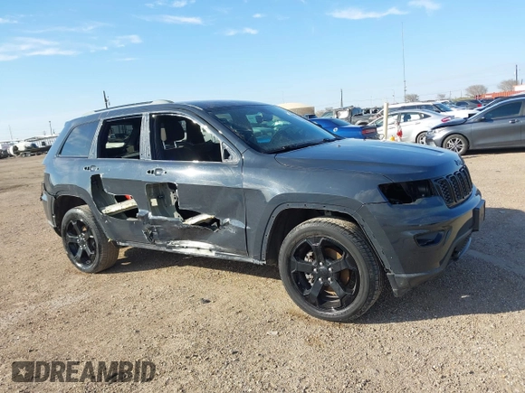 2018 Jeep Grand Cherokee Laredo E with VIN 1C4RJFAG4JC370502, listed as a IAAI auction lot 41342367 with 104,307 mi miles. Bid and sale history available at carsss.com. Image 14.