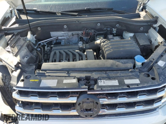 2018 Volkswagen Atlas SE z VIN 1V2LR2CA1JC558294, wystawiony jako Copart lot #54971575 z przebiegiem 65 118 mil mil oraz Szkoda całkowita • Salvage title. Historia ofert i sprzedaży dostępna na DreamBid. Obrazek 11.