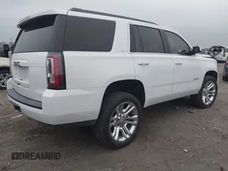 2018 GMC Yukon SLT with VIN 1GKS1BKC3JR279163, listed as a IAAI auction lot 40973940 with 122,445 mi miles. Bid and sale history available at carsss.com. Image 4.