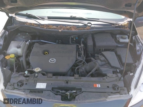 2014 Mazda 5 Grand Touring with VIN JM1CW2DL8E0171095, listed as a IAAI auction lot 41962650 with 85,048 mi miles and . Bid and sale history available at DreamBid. Image 10.