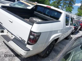 2006 Honda Ridgeline RTL z VIN 2HJYK16506H512654, wystawiony jako IAAI lot #42245264 z przebiegiem 303 551 mil mil oraz . Historia ofert i sprzedaży dostępna na DreamBid. Obrazek 4.