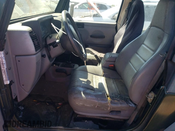 1998 Jeep Wrangler Sport with VIN 1J4FY19S2WP790179, listed as a Copart auction lot 69853294 with 148,675 mi miles and Salvage Title. Bid and sale history available at carsss.com. Image 7.