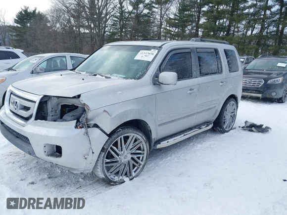2011 Honda Pilot EX-L with VIN 5FNYF3H6XBB041672, listed as a IAAI auction lot 41337038 with 205,741 mi miles and . Bid and sale history available at DreamBid. Image 2.