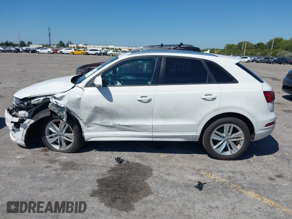 2017 Audi Q3 Premium with VIN WA1BCCFSXHR016914, listed as a IAAI auction lot 41784539 with 94,862 mi miles and . Bid and sale history available at DreamBid. Image 14.