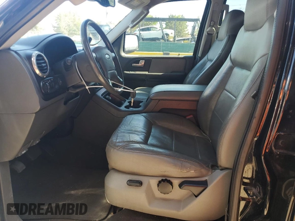 2003 Ford Expedition Special Service with VIN 1FMFU16L83LC58206, listed as a Copart auction lot 57591205 with 184,133 mi miles and Salvage title. Bid and sale history available at DreamBid. Image 7.