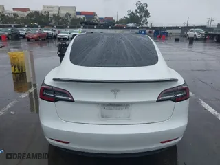 2023 Tesla Model 3 with VIN 5YJ3E1EA1PF426684, listed as a IAAI auction lot 41507661 with 28,703 mi miles. Bid and sale history available at carsss.com. Image 15.