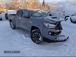 2021 Toyota Tacoma 4WD SR5 with VIN 3TMDZ5BN9MM099546, listed as a IAAI auction lot 41062254 with 1 mi miles. Bid and sale history available at carsss.com. Image 1.
