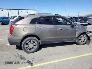 2014 Cadillac SRX z VIN 3GYFNAE37ES609830, wystawiony jako Copart lot #51542955 z przebiegiem 122 560 mil mil oraz Szkody całkowita. Historia ofert i sprzedaży dostępna na DreamBid. Obrazek 3.