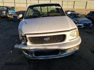 1997 Ford F-150 XL with VIN 1FTDF08W3VKD54292, listed as a Copart auction lot 80205784 with 186,944 mi miles and Salvage Title. Bid and sale history available at carsss.com. Image 5.
