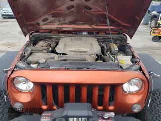 2014 Jeep Wrangler Rubicon with VIN 1C4BJWCG2EL303420, listed as a Copart auction lot 63550985 with 87,175 mi miles and Salvage title. Bid and sale history available at DreamBid. Image 12.