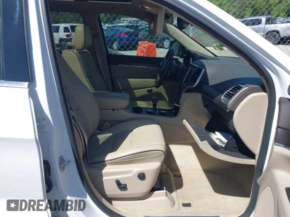 2015 Jeep Grand Cherokee Overland with VIN 1C4RJECG6FC707458, listed as a IAAI auction lot 41996350 with 128,307 mi miles and . Bid and sale history available at DreamBid. Image 5.