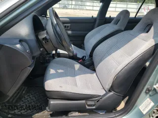 1994 Toyota Tercel DX z VIN JT2EL43T3R0489039, wystawiony jako Copart lot #67834034 z przebiegiem 139 726 mil mil oraz Szkody całkowita. Historia ofert i sprzedaży dostępna na DreamBid. Obrazek 7.
