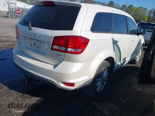 2013 Dodge Journey SXT with VIN 3C4PDCBG1DT563727, listed as a IAAI auction lot 42003852 with 202,516 mi miles and . Bid and sale history available at DreamBid. Image 4.