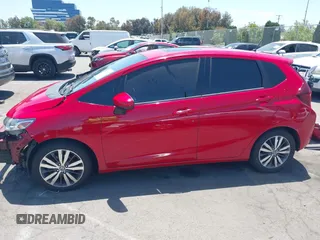2015 Honda Fit EX-L z VIN 3HGGK5H84FM742893, wystawiony jako IAAI lot #42272487 z przebiegiem 84 942 mil mil oraz . Historia ofert i sprzedaży dostępna na DreamBid. Obrazek 15.