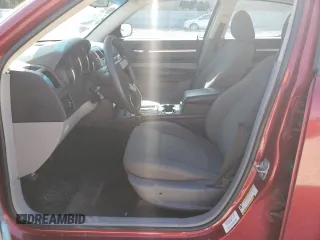 2010 Dodge Charger with VIN 2B3CA4CD8AH146922, listed as a Copart auction lot 77013754 with 131,822 mi miles and Salvage Title. Bid and sale history available at carsss.com. Image 7.