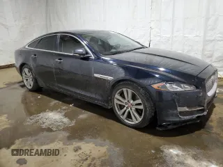 2016 Jaguar XJ with VIN SAJXJ1GD2G8V98776, listed as a Copart auction lot 41959995 with 77,391 mi miles and Salvage title. Bid and sale history available at DreamBid. Image 4.