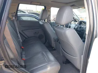 2007 Jeep Grand Cherokee Laredo with VIN 1J8GR48K77C582875, listed as a IAAI auction lot 42061653 with 259,767 mi miles. Bid and sale history available at carsss.com. Image 8.