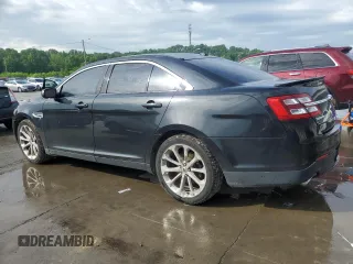 2014 Ford Taurus Limited z VIN 1FAHP2J88EG177883, wystawiony jako Copart lot #56119255 z przebiegiem 141 743 mil mil oraz Szkoda całkowita • Salvage title. Historia ofert i sprzedaży dostępna na DreamBid. Obrazek 2.