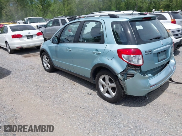 2009 Suzuki SX4 Touring AWD z VIN JS2YB417096201672, wystawiony jako IAAI lot #42209018 z przebiegiem 64 879 mil mil oraz . Historia ofert i sprzedaży dostępna na DreamBid. Obrazek 3.