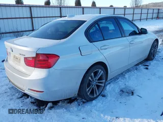 2014 BMW 3 Series 328i xDrive with VIN WBA3B3C55EJ978766, listed as a IAAI auction lot 41535194 with 110,387 mi miles. Bid and sale history available at carsss.com. Image 4.