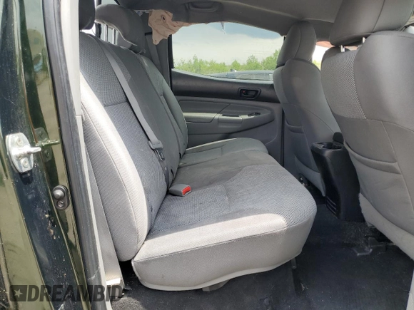 2012 Toyota Tacoma z VIN 3TMLU4ENXCM082978, wystawiony jako Copart lot #60069475 z przebiegiem 169 533 mil mil oraz Szkoda całkowita • Salvage title. Historia ofert i sprzedaży dostępna na DreamBid. Obrazek 10.