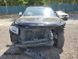 2014 Jeep Grand Cherokee Limited with VIN 1C4RJFBG2EC254977, listed as a Copart auction lot 63084215 with 155,022 mi miles and Salvage title. Bid and sale history available at DreamBid. Image 5.
