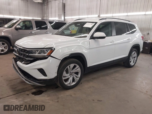 2021 Volkswagen Atlas SE z VIN 1V2HR2CA3MC539997, wystawiony jako IAAI lot #41977786 z przebiegiem 77 372 mil mil oraz . Historia ofert i sprzedaży dostępna na DreamBid. Obrazek 2.