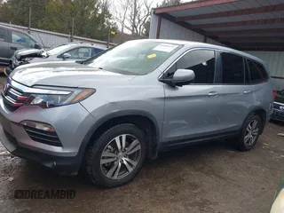 2016 Honda Pilot EX-L with VIN 5FNYF5H53GB040003, listed as a IAAI auction lot 41452374 with Not Provided miles and . Bid and sale history available at DreamBid. Image 13.
