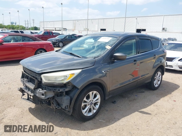 2017 Ford Escape SE z VIN 1FMCU0GD1HUE71410, wystawiony jako IAAI lot #42026516 z przebiegiem 173 804 mil mil oraz . Historia ofert i sprzedaży dostępna na DreamBid. Obrazek 19.