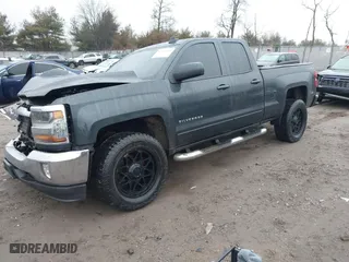 2018 Chevrolet Silverado 1500 LT with VIN 1GCVKREC4JZ141125, listed as a IAAI auction lot 41474345 with 198,197 mi miles. Bid and sale history available at carsss.com. Image 2.