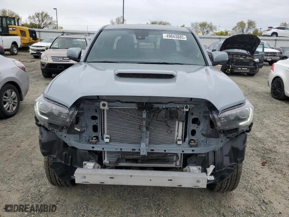 2021 Toyota Tacoma 4WD SR with VIN 3TYSZ5AN9MT023032, listed as a Copart auction lot 49843885 with NaN miles and Salvage Title. Bid and sale history available at carsss.com. Image 5.