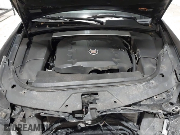 2013 Cadillac CTS Premium z VIN 1G6DS5E34D0103328, wystawiony jako IAAI lot #41501406 z przebiegiem 157 633 mil mil oraz . Historia ofert i sprzedaży dostępna na DreamBid. Obrazek 10.