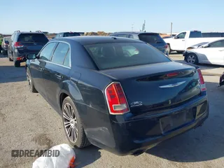 2013 Chrysler 300 with VIN 2C3CCABG7DH573164, listed as a IAAI auction lot 41851066 with 218,234 mi miles. Bid and sale history available at carsss.com. Image 3.