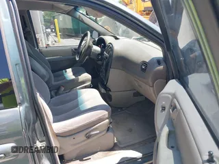 2003 Chrysler Town & Country LX with VIN 2C4GP44R53R385043, listed as a IAAI auction lot 42130516 with 252,056 mi miles. Bid and sale history available at carsss.com. Image 5.