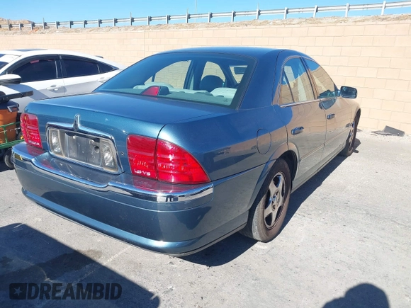2001 Lincoln LS w/Base Pkg with VIN 1LNHM87A31Y617332, listed as a IAAI auction lot 41317767 with 141,931 mi miles. Bid and sale history available at carsss.com. Image 4.