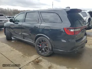 2021 Dodge Durango SRT 392 with VIN 1C4SDJGJ9MC574957, listed as a Copart auction lot 83679864 with 61,295 mi miles and Salvage Title. Bid and sale history available at carsss.com. Image 2.