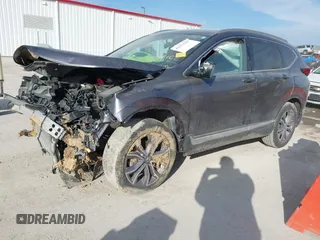2020 Honda CR-V Touring with VIN 2HKRW2H91LH605995, listed as a IAAI auction lot 41672787 with 50,151 mi miles and . Bid and sale history available at DreamBid. Image 2.