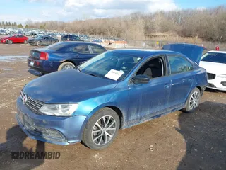 2016 Volkswagen Jetta Sedan 1.4T SE with VIN 3VWD67AJ3GM292876, listed as a IAAI auction lot 41674742 with 84,659 mi miles. Bid and sale history available at carsss.com. Image 2.