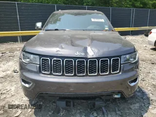 2018 Jeep Grand Cherokee Limited with VIN 1C4RJEBG6JC247468, listed as a Copart auction lot 59789015 with 84,005 mi miles and Salvage title. Bid and sale history available at DreamBid. Image 5.