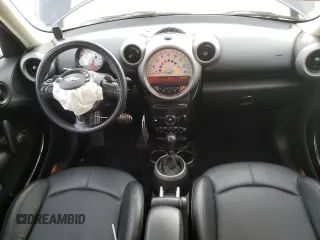 2012 MINI Countryman S with VIN WMWZC5C55CWL64092, listed as a Copart auction lot 50703855 with 69,785 mi miles and Salvage Title. Bid and sale history available at DreamBid. Image 8.
