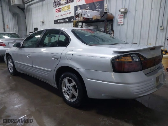 2003 Pontiac Bonneville SE with VIN 1G2HX52K734152756, listed as a IAAI auction lot 41482255 with 219,472 mi miles. Bid and sale history available at carsss.com. Image 3.