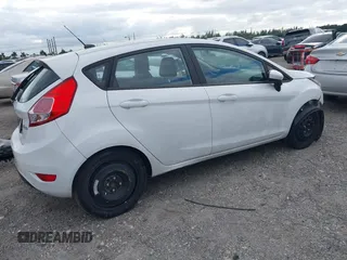 2019 Ford Fiesta SE z VIN 3FADP4EJ5KM132862, wystawiony jako IAAI lot #40893430 z przebiegiem 91 011 mil mil oraz . Historia ofert i sprzedaży dostępna na DreamBid. Obrazek 4.