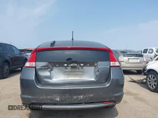 2010 Honda Insight EX with VIN JHMZE2H71AS043465, listed as a IAAI auction lot 42312556 with 151,009 mi miles and . Bid and sale history available at DreamBid. Image 6.