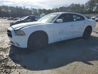 2012 Dodge Charger Police with VIN 2C3CDXAG7CH240124, listed as a Copart auction lot 42676875 with 121,937 mi miles and Salvage Title. Bid and sale history available at carsss.com. Image 1.