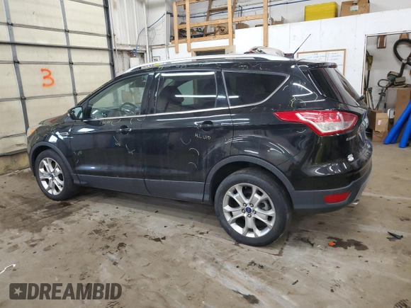 2015 Ford Escape Titanium with VIN 1FMCU9JX9FUA30970, listed as a Copart auction lot 41780275 with 106,114 mi miles and Salvage Title. Bid and sale history available at DreamBid. Image 2.